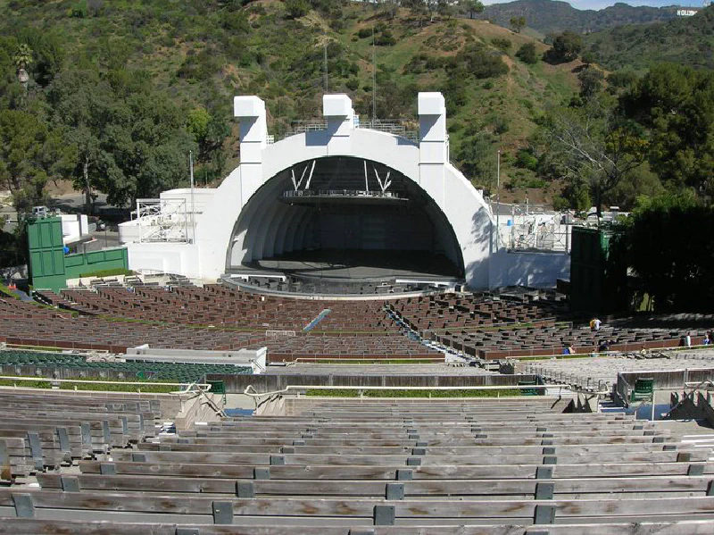 View toward the Hollywood Bowl shell and stage from a bench seat on the right side of the bowl
