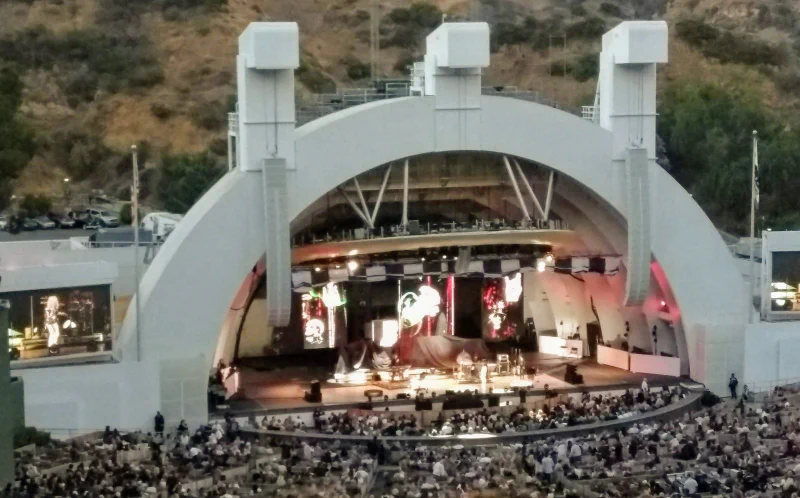 The Hollywood Bowl amphitheater at dusk as the crowd fills the bench sections before a concert